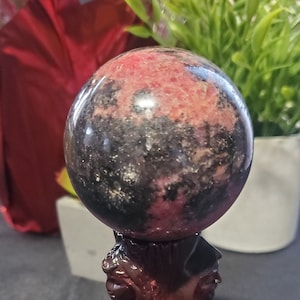 A Gorgeous Rhodonite Crystal Sphere - Helps to Clear Away Emotional Wounds And Scars - Crystal Store - Crystal Healing