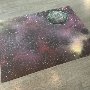 Handmade spray paint outer space art