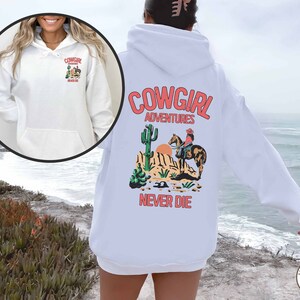 Cowgirl Adventures Never Die Hoodie Cowgirl Shirt Horse Hoodie Western Hoodie Oversized Cowgirl Sweatshirt with Words On Back Cowgirl Gift