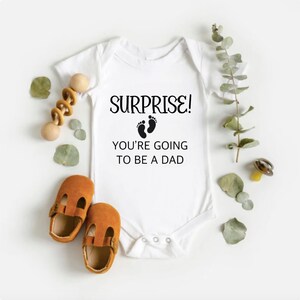 Surprise You are going to be a daddy Bodysuit/ Pregnancy announcement/ baby reveal/ Funny bodysuit/ Baby shower gift/ new dad/ new baby