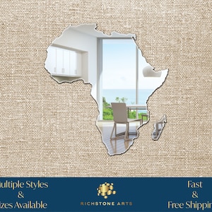 May include: A beige canvas background with a cutout of the continent of Africa. The cutout reveals a view of a modern interior with a window overlooking a beach. The text "Multiple Styles & Sizes Available" is at the bottom left of the image. The text "Fast & Free Shipping!" is at the bottom right of the image. The text "Richstone Arts" is in the center of the image.