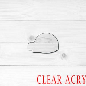 May include: A clear acrylic cutout of a helmet, a popular craft supply for creating custom decorations and personalized gifts.
