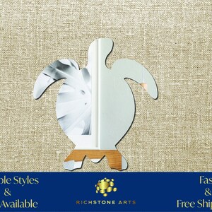 May include: A mirrored turtle silhouette, a decorative wall hanging. Multiple styles and sizes available. Fast and free shipping. Richstone Arts.