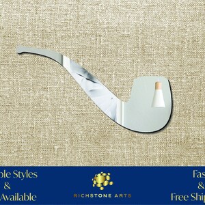 May include: A silver mirror in the shape of a pipe. The mirror is reflecting a light fixture. The text "Multiple Styles & Sizes Available" is in the lower left corner of the image. The text "Fast & Free Shipping!" is in the lower right corner of the image. The text "RICHSTONE ARTS" is in the center of the image.