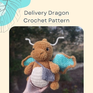 May include: A crocheted brown dragon with teal wings and a gray and white bag. The dragon is holding a package and has a white and brown antenna. The text "Delivery Dragon Crochet Pattern" is at the top of the image.