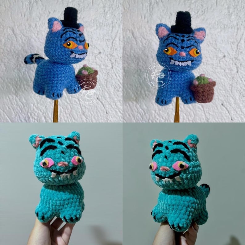 May include: Crocheted cat dolls in shades of blue and teal, each with a mischievous grin and a tiny black top hat. Some hold a miniature cupcake. The handmade toys have pink accents and are displayed against a neutral background.