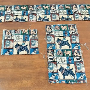 May include: Three pieces of fabric with a blue, brown and white patterned design featuring dogs and the text "Faithful Companion".