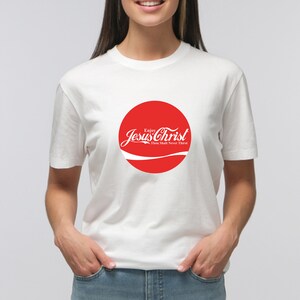 May include: White t-shirt with a red circle graphic that says "Enjoy Jesus Christ Thou Shalt Never Thirst".