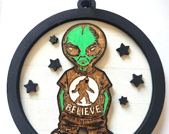Alien wearing Bigfoot Believe T-Shirt Wooden Shiplap Ornament for Cryptid Lovers