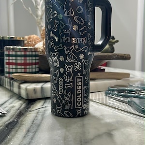 may include: Frenchie engraved cup, engraved Frenchie tumbler, Stanley engraved French bulldog cup, French bulldog tumblers, dog engraved tumbler, French engraved cup, engraved Frenchie tumbler, Stanley engraved French bulldog cup, French bulldog tumblers, Stanley engraved french bulldog cup, chihuahuas cup