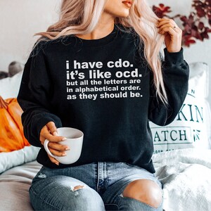 I Have CDO-sweater, het is net als OCS, maar alle letters zijn in alfabetische volgorde, grappig OCS-sweater Psychologie Truien Sweatshirts Unisex