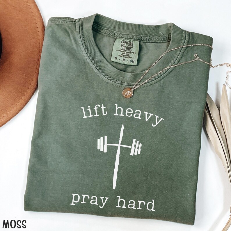 Lift Heavy Pray Hard Comfort Colors Shirt Gift For Christian Gym Shirt Faith Based Workout Shirt Jesus And Fitness T-Shirt Barbell Cross Tee Moss