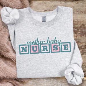 Mother Baby Nurse Sweatshirt MBU Nurse Crewneck Mother Baby Unit L&D Nurse Shirt Postpartum RN Sweater Obstetrics Nurse Gift For NICU Nurse