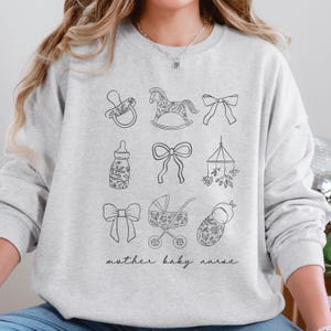 Mother Baby Nurse Sweatshirt MBU Nurse Crewneck Mother Baby Unit L&D Nurse Shirt Postpartum RN Sweater Obstetrics Nurse Gift For NICU Nurse