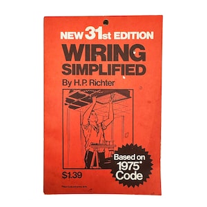 May include: A vintage book cover in orange features the title "WIRING SIMPLIFIED" in bold white letters. The cover includes the text "NEW 31st EDITION" and "By H.P. Richter." A black and white illustration depicts a person working on wiring. The cover is based on the 1975 code.