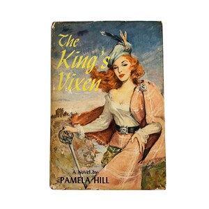 May include: Vintage paperback book cover titled "The King's Vixen" by Pamela Hill. The cover art features a woman in a pink and white outfit, holding a sword. The background shows a landscape with a castle and a blue sky.