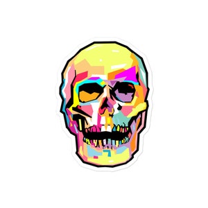 May include: A colorful sticker featuring a stylized skull design. The skull is rendered in a pop art style with vibrant hues of yellow, pink, orange, blue, and green. The design has a black outline.