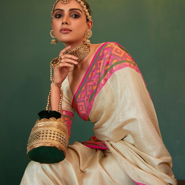 Latest kanjeevaram silk saree with pochampally pattern , beautiful contrast border and rich zari weaving pallu