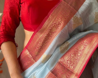 Soft linen saree with banarasi zari weaving, contrast border and rich pallu , comes with running linen zari weaving brocade blouse