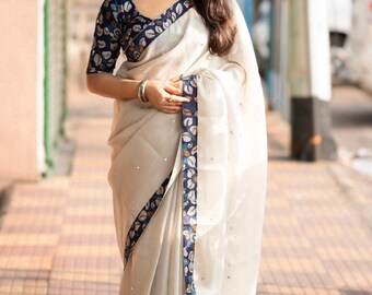 Linen jute silk saree with kalamkari printed border and blouse, gota mirror work used all over saree and blouse comes with matching jhumkas