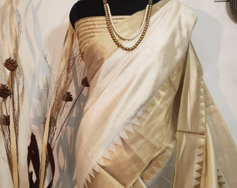 Schlichter Saree aus weicher Assam-Baumwollseide mit Schläfenbordüre und edler Pallu- und Zari-Webbluse, perfekt für traditionelle Anlässe