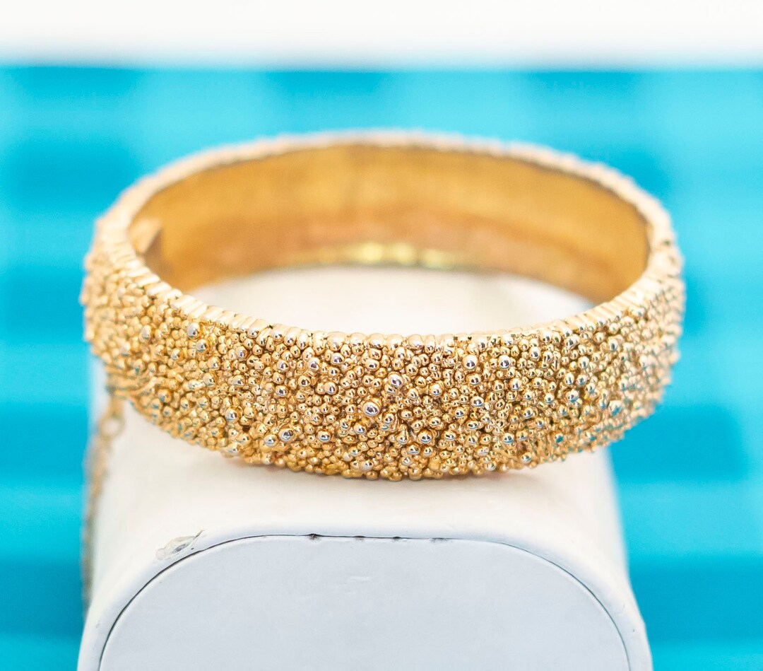 Vintage Gold Tone Fashionable Rocky Bangle 7 1/2 Inch by Vintage Gold Tone Fashionable Rocky Bangle 7 1/2 Inch by