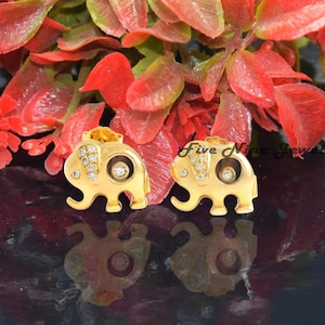 Orecchini a forma di elefante, orecchini a forma di elefante con diamanti, orecchini a forma di elefante con simpatici animali, orecchini a forma di elefante con occhio di tigre, orecchini a forma di elefante con pietre preziose