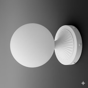May include: A white wall sconce with a spherical globe and a decorative, fan-shaped base. The sconce is made of a matte white material and is mounted on a dark gray wall. The design is modern and minimalist.