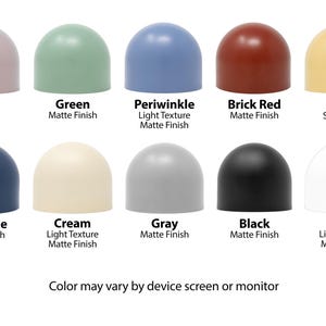 a group of different colors of hats on a white background