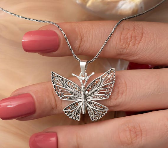 Filigree butterfly necklace discount