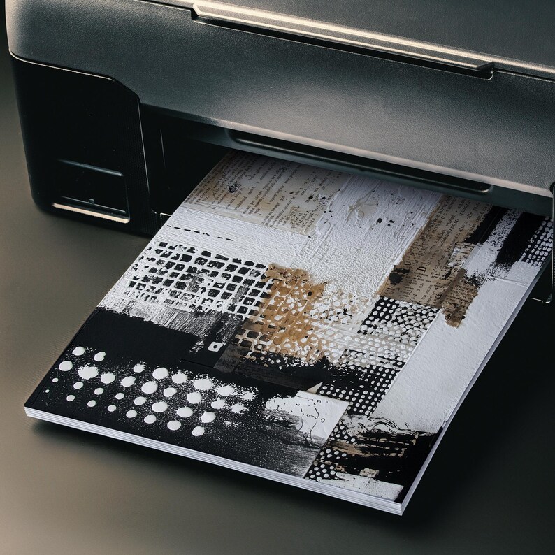 May include: A black inkjet printer printing a stack of art prints. The artwork features a collage of textures, including newsprint, paint strokes, and geometric patterns in black, white, and tan.