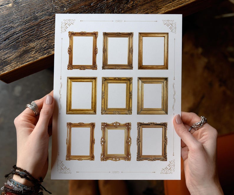 May include: A sheet of paper displaying nine decorative gold-coloured picture frame designs. The frames have various ornate styles and details. The paper is held by hands, highlighting the frames' potential use for art or photography.