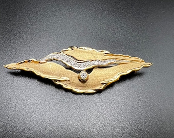 Diamond-gold brooch Hard work!