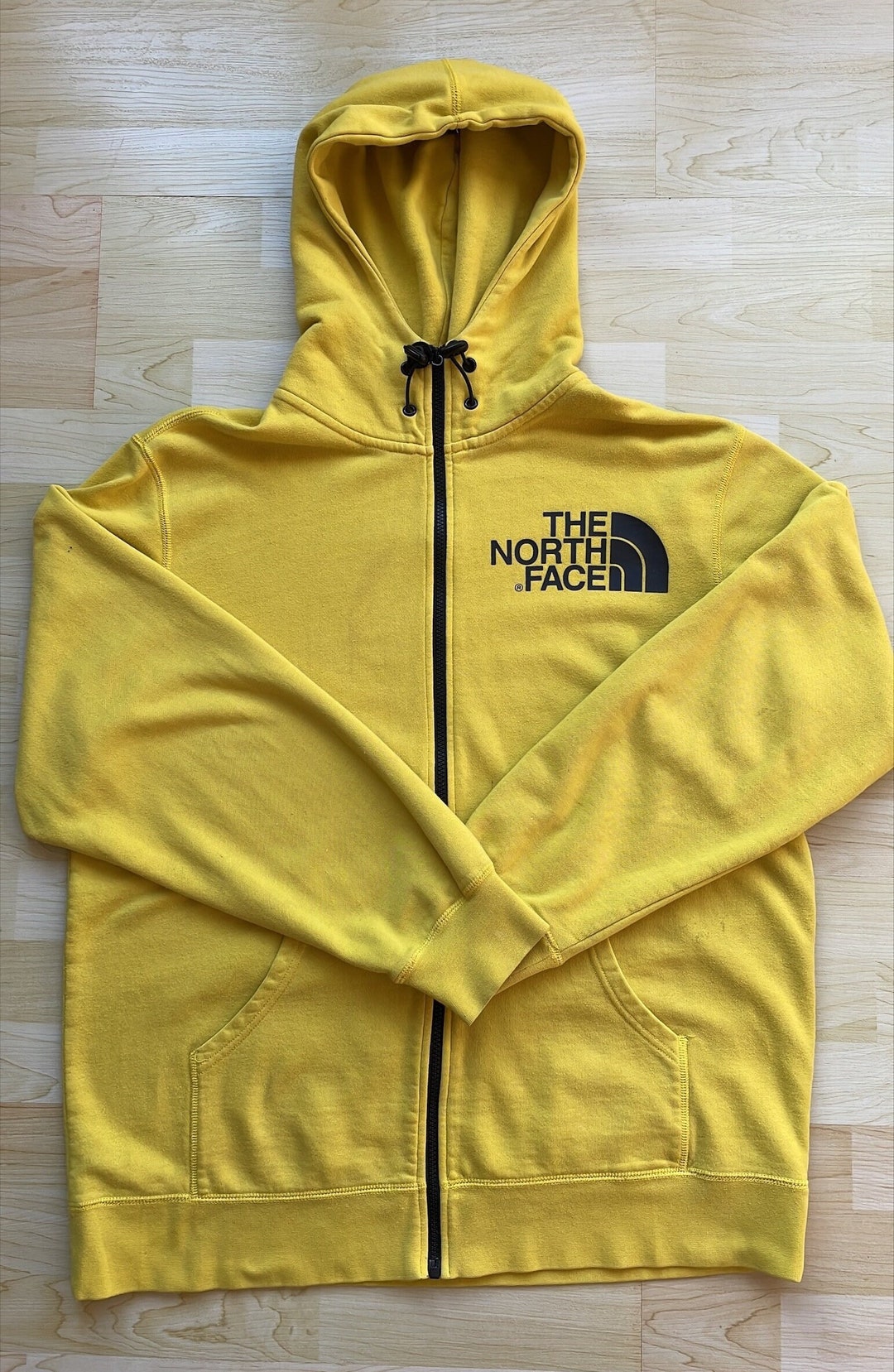 Black and yellow north face hoodie hot sale
