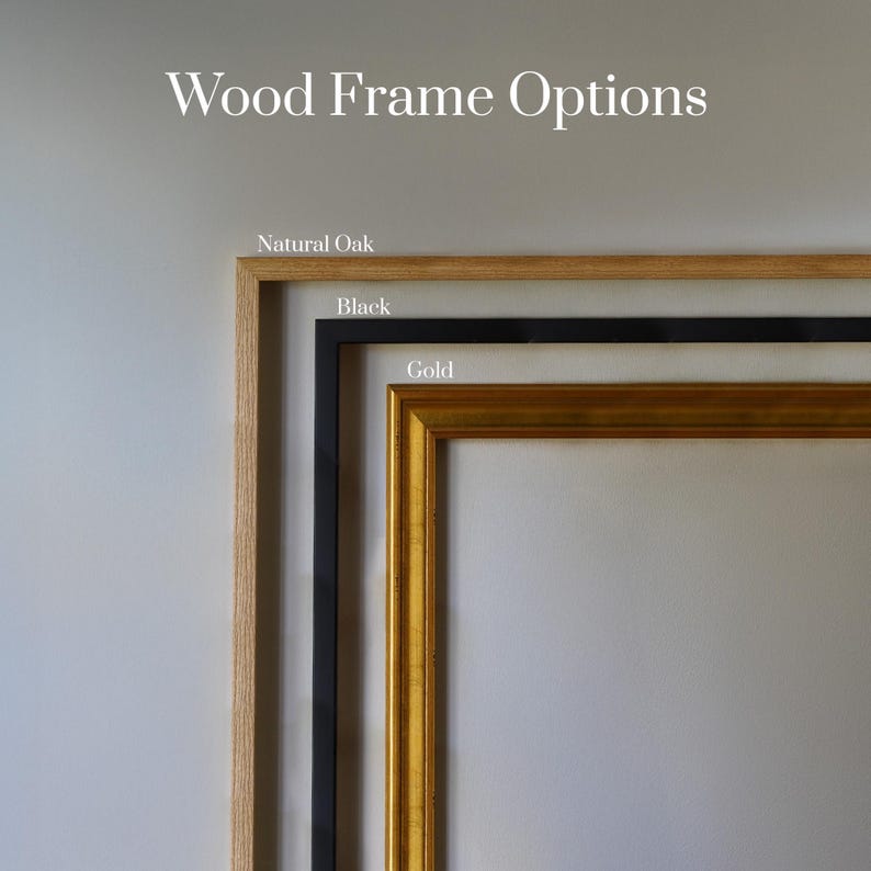 May include: Image showcasing three wood frame options: Natural Oak, Black, and Gold. The text "Wood Frame Options" is displayed at the top. The frames are rectangular and vary in style and color, offering a selection for artwork or mirrors.