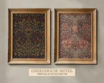 May include: Two framed prints with floral patterns in shades of red, green, and blue. The frames are a light wood color. The text below the frames reads "GREENHOUSE HOTEL ORIGINAL & VINTAGE DECOR".