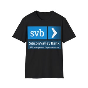 May include: Black t-shirt with a blue and white logo that says "svb" and "Silicon Valley Bank" with the text "Risk Management Department 2023" underneath.