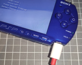 Sony PSP-2000 Black - Good Condition - Charger + New Battery