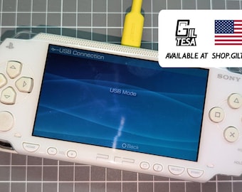 樹脂ボタンと LED ライトで改造されたカスタム PSP コンソール ソニー