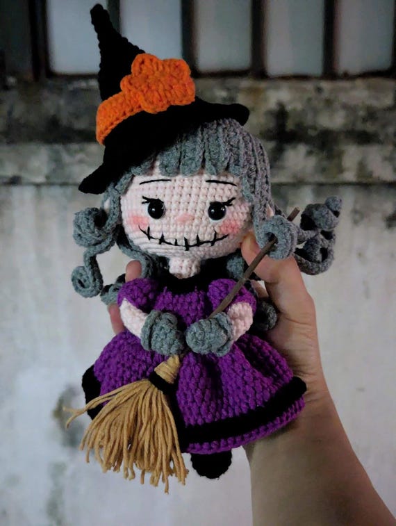 Handmade creepy-cute amigurumi witch doll that walks the perfect line between adorable and unsettling — a genuine one-person craft, not a factory toy.