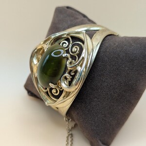 Vintage Whiting and Davis Gold Cuff Bracelet Green Cabochon Cats Eye Dragons Eye Signed Whiting and Davis Hinged Clamper Bracelet