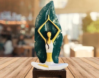 Yoga Girl Statue with Leaf: Elegant Polyester Sculpture