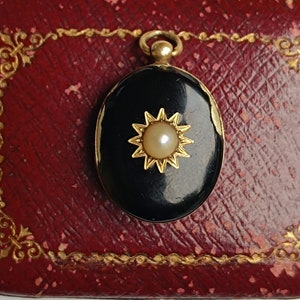 A tiny Antique 14ct gold & black enamel Mourning locket