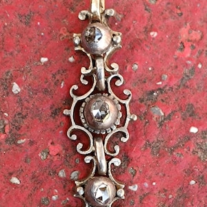An Antique Georgian Silver Rosecut Diamond Charm