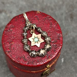 An Antique Silver Rosecut Diamond Pendant / Charm