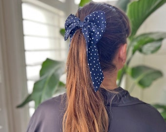 Navy polka dot hair bow