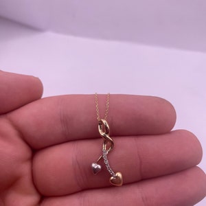 Wisiorek z diamentami ze złota próby 14k
