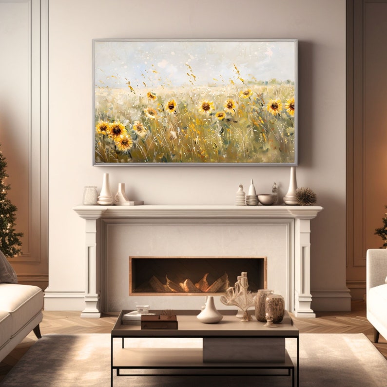 May include: A painting of a field of sunflowers in a light blue, yellow, and green color scheme. The sunflowers are in various stages of bloom, with some fully open and others still in bud. The painting is framed in a silver frame and is hanging above a fireplace.