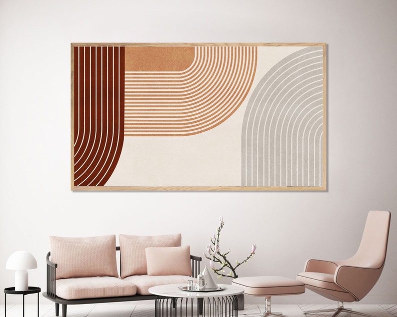 May include: Abstract art print with a geometric design featuring curved lines in shades of brown, orange, and gray. The print is framed in a natural wood frame.