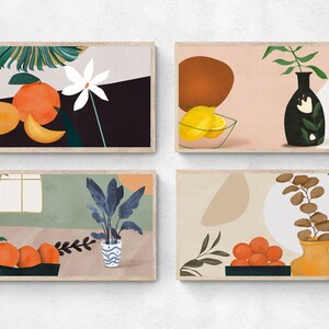 May include: Four framed illustrations with a minimalist style. Each illustration features a different still life with fruit, plants, and vases. The first illustration features a white flower, green leaves, and orange fruit. The second illustration features a vase with green leaves, a brown abstract shape, and lemons in a glass bowl. The third illustration features a green plant in a blue and white patterned vase. The fourth illustration features a vase with brown leaves and orange fruit.